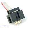 Shrouded 2x3-pin box header with a ribbon cable and IDC connector plugged into it. (SKU: POLOLU-972 Image 3)