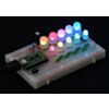 A chain of addressable RGB LEDs (#2535 and #2536) on a breadboard controlled by an A-Star 32U4 Micro. (SKU: POLOLU-2536 Image 3)