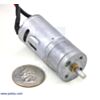 Dagu Wild Thumper all-terrain chassis gearmotor with US quarter for size reference. (SKU: POLOLU-1567 Image 14)