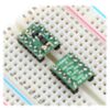Two DRV8838 Single Brushed DC Motor Driver Carriers plugged into a breadboard. (SKU: POLOLU-2990 Image 6)