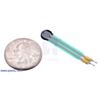 Force-sensing resistor (0.2 circle) with US quarter for size reference. (SKU: POLOLU-1695 Image 2)