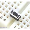 Mini 2-pin PCB-mount pushbutton switch on a breadboard. (SKU: POLOLU-1400 Image 2)