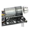 The machined piece of the 4 mm scooter wheel adapter mounted to the output shaft of a 25D mm gearmotor. (SKU: POLOLU-2672 Image 10)