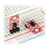 QTR-1A and QTR-1RC reflectance sensors plugged into a breadboard in two possible orientations. (SKU: POLOLU-2458 Image 3)