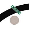 QTR-3A or QTR-3RC reflectance sensor array on a 3/4 inch line with a quarter for size reference. (SKU: POLOLU-2457 Image 4)