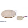 Shaftless vibration motor 10x2.0mm with quarter for size reference. (SKU: POLOLU-1638 Image 4)