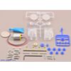 Parts included with the Tamiya 70189 mini motor low-speed gearbox (4-speed) kit with quarter for size reference. (SKU: POLOLU-1684 Image 2)