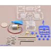 Parts included with the Tamiya 70190 mini motor multi-ratio gearbox (12-speed) kit with quarter for size reference. (SKU: POLOLU-1683 Image 2)