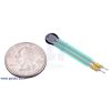 Force-sensing resistor (0.2 circle) with US quarter for size reference. (SKU: POLOLU-1695 Image 2)