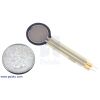 Force-sensing resistor (0.6 circle) with US quarter for size reference. (SKU: POLOLU-1696 Image 2)