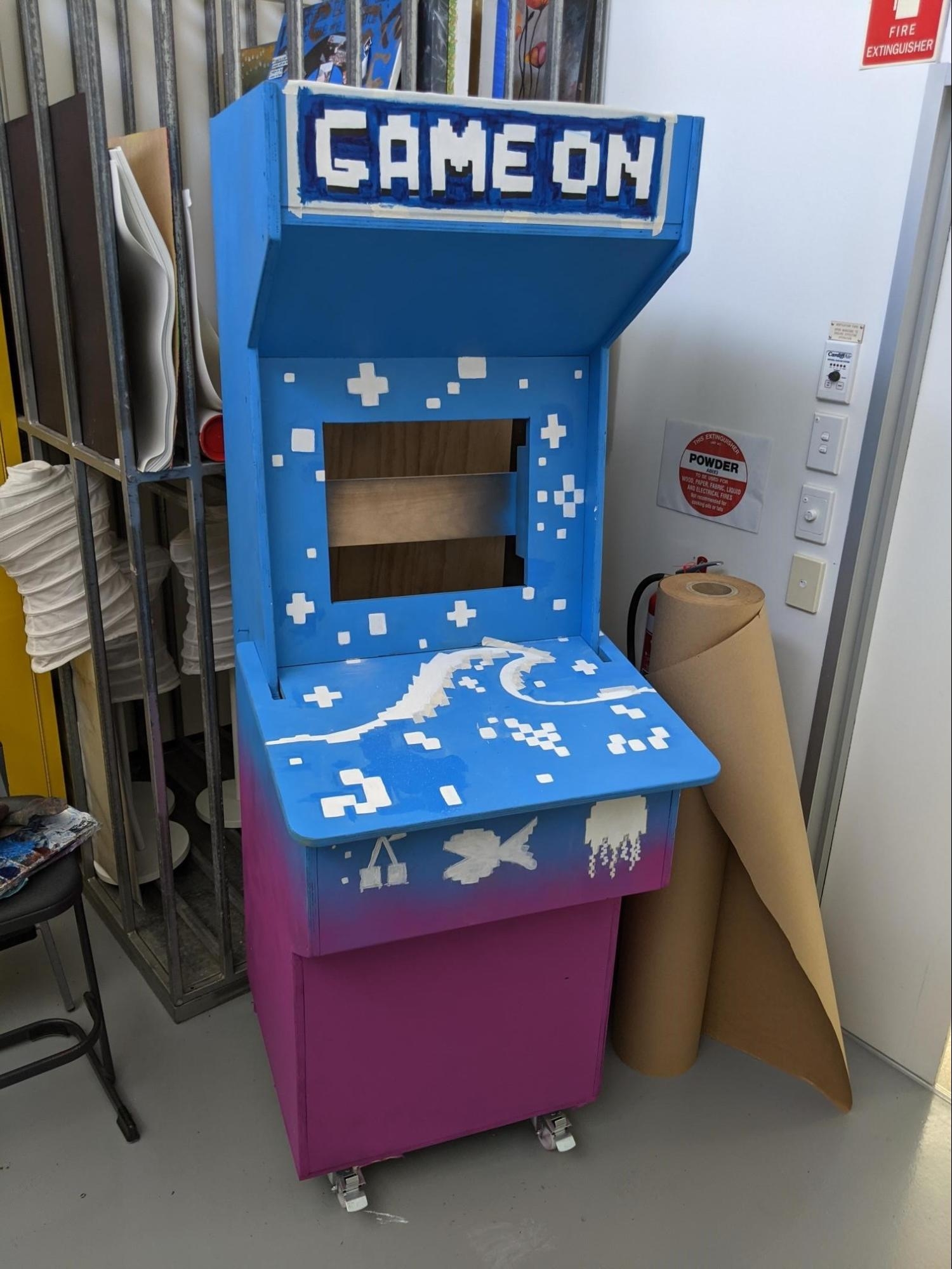 A new look for the arcade machine, some details and 'Game on' written on top