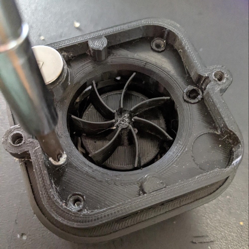 mini desk vacuum dust cover screwing the dust cover onto the vacuum