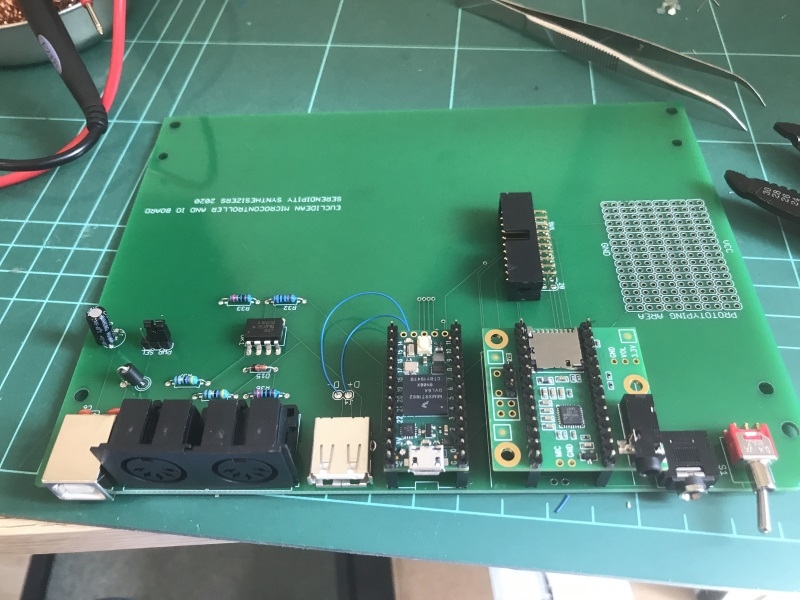 The Teensy and audio shield in place, completing the lower PCB