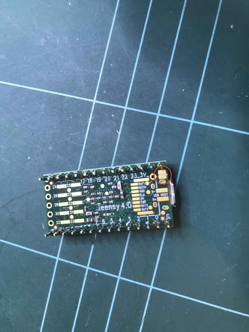 The Teensy with cut pads to disconnect USB voltage