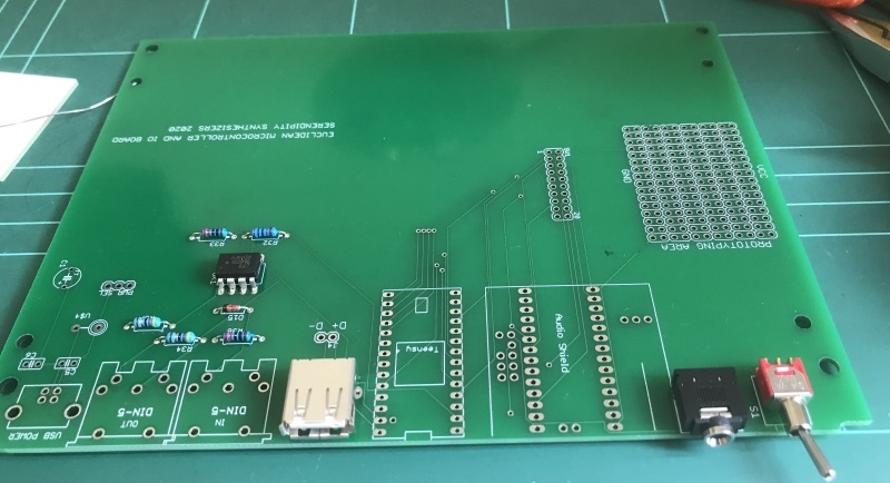 The lower board other low profile components(IC's, plugs and switches) soldered