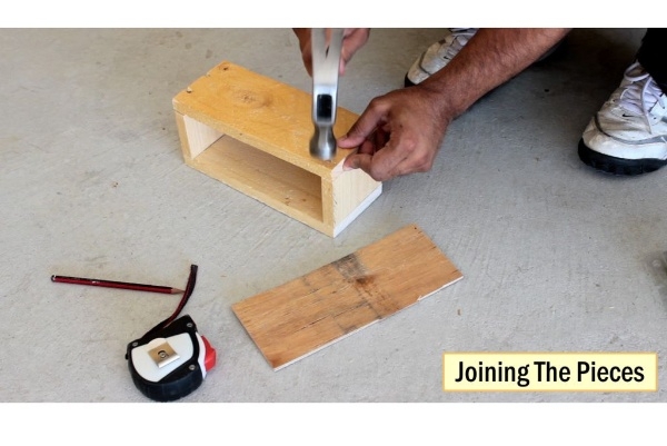 Joining the box pieces together for enclosure