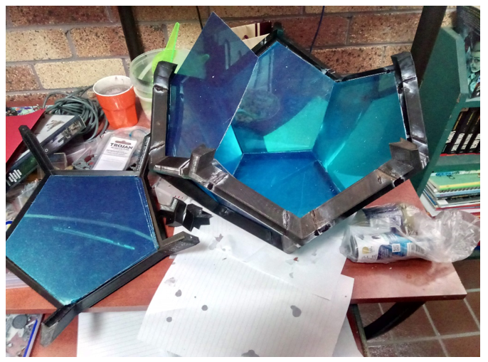 Dodecahedron External Frame taking shape with small test fit of the mirrors Dodecahedron External Frame taking shape with small test fit of the mirrors