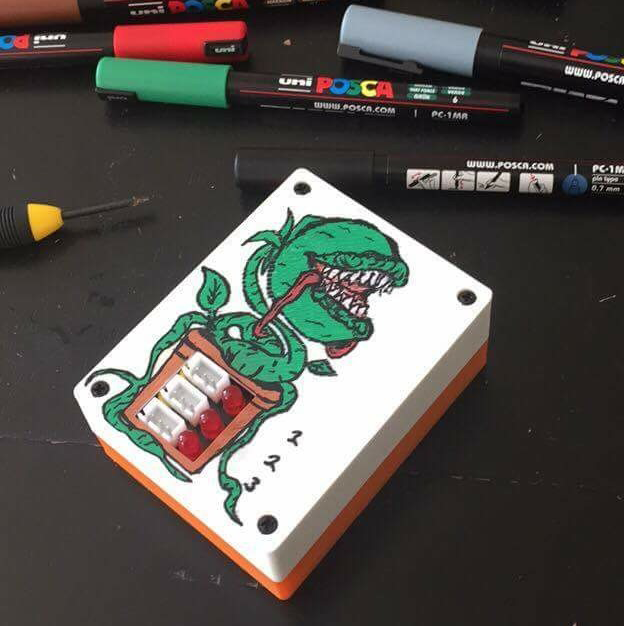 Painting enclosure with paint pens